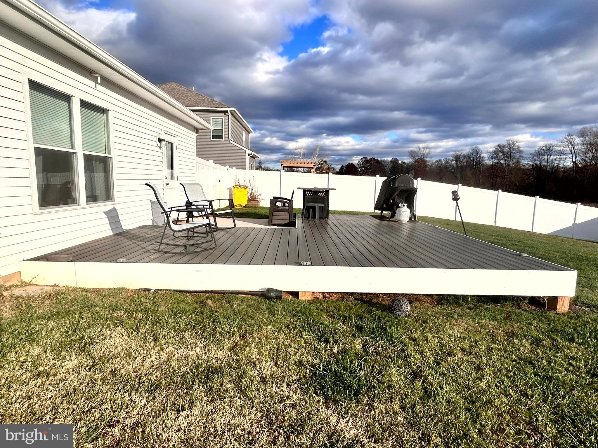 90 Rappahannock Run Falling Waters, WV 25419 - Photo 32 of 47 a view of a swimming pool with an outdoor seating