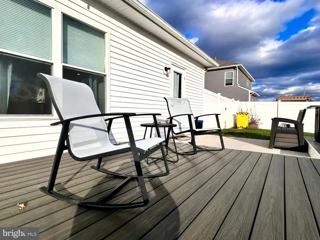 a view of a terrace with furniture