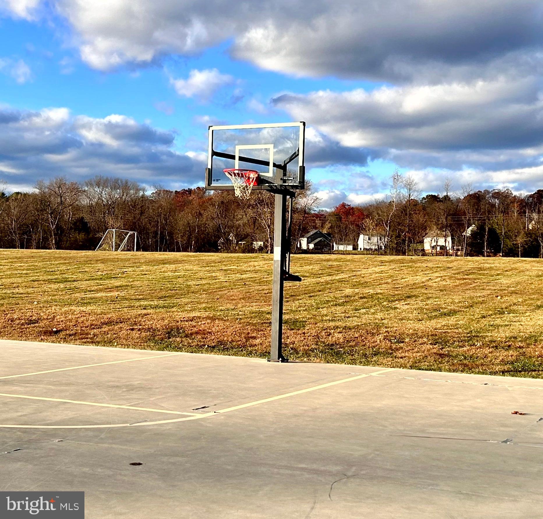 90 Rappahannock Run Falling Waters, WV 25419 - Photo 46 of 47 a view of a swimming pool with an ocean view