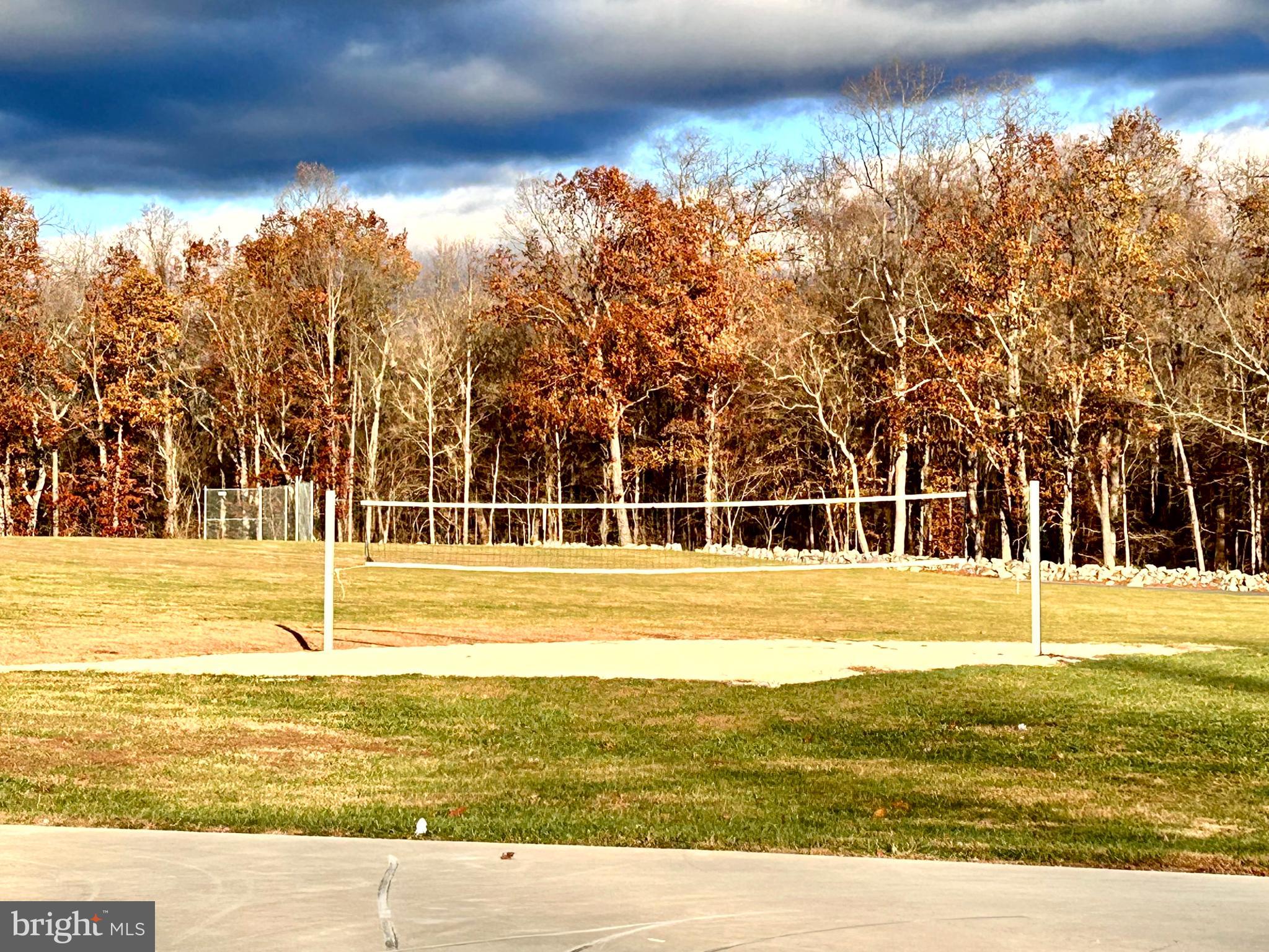 90 Rappahannock Run Falling Waters, WV 25419 - Photo 47 of 47 a view of a swimming pool with an outdoor space and seating area