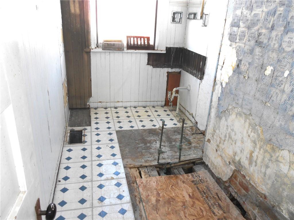 601 Locust Place Sewickley, PA 15143 - Photo 12 of 23 a bathroom with a shower and a sink