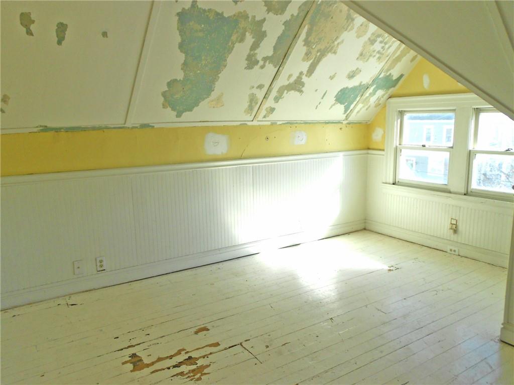 601 Locust Place Sewickley, PA 15143 - Photo 21 of 23 a view of an empty room and a window