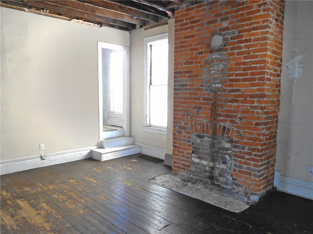 601 Locust Place Sewickley, PA 15143 - Photo 5 of 23 a view of empty room with wooden floor