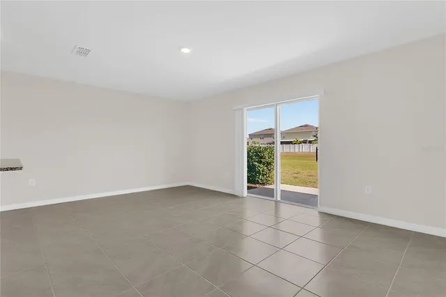 a view of a kitchen with a sink and a microwave