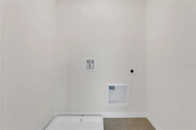 an empty room with a bench