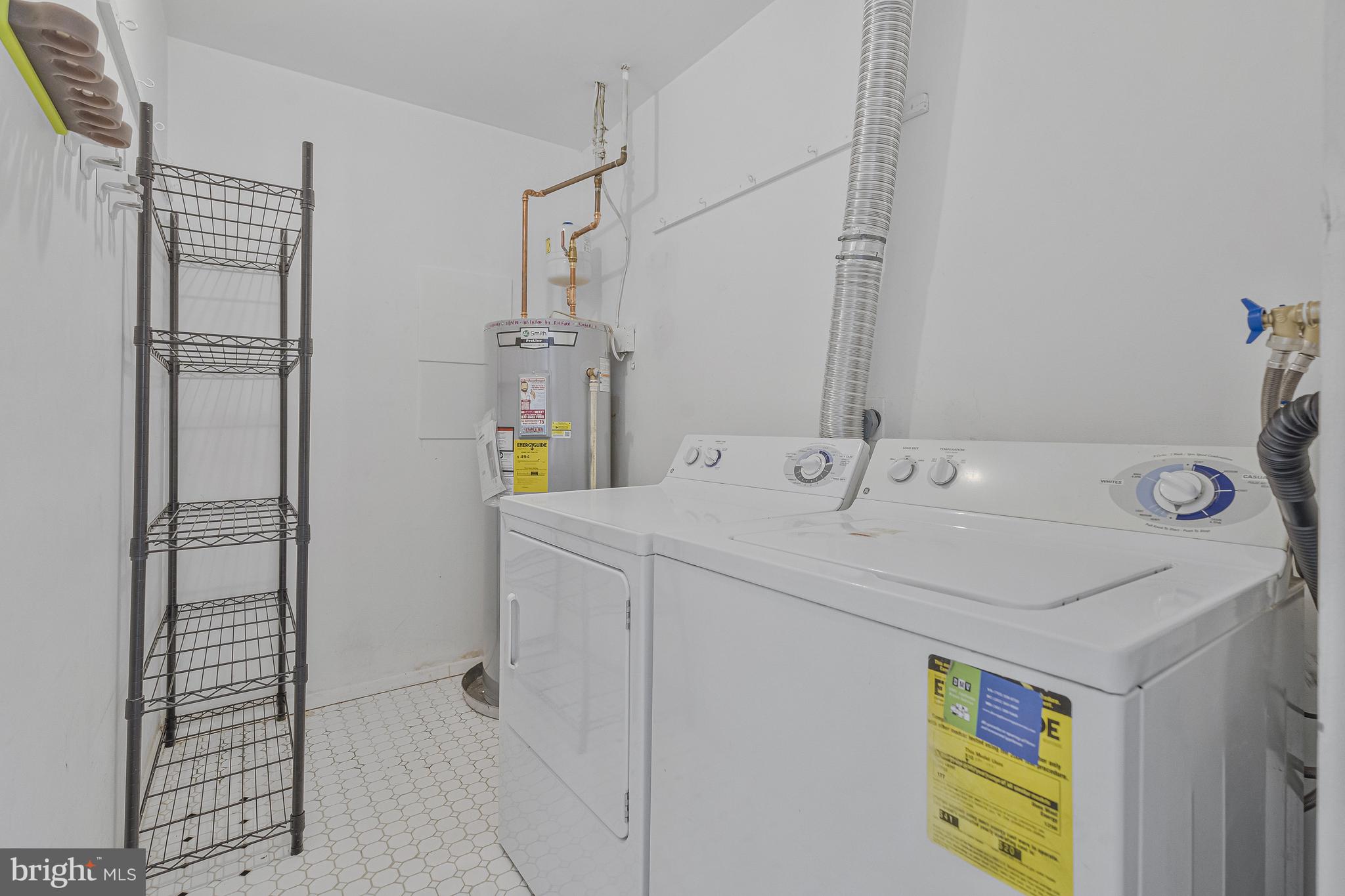 1353 Northgate Square Reston, VA 20190 - Photo 13 of 26 Laundry room with full-size washer/dryer