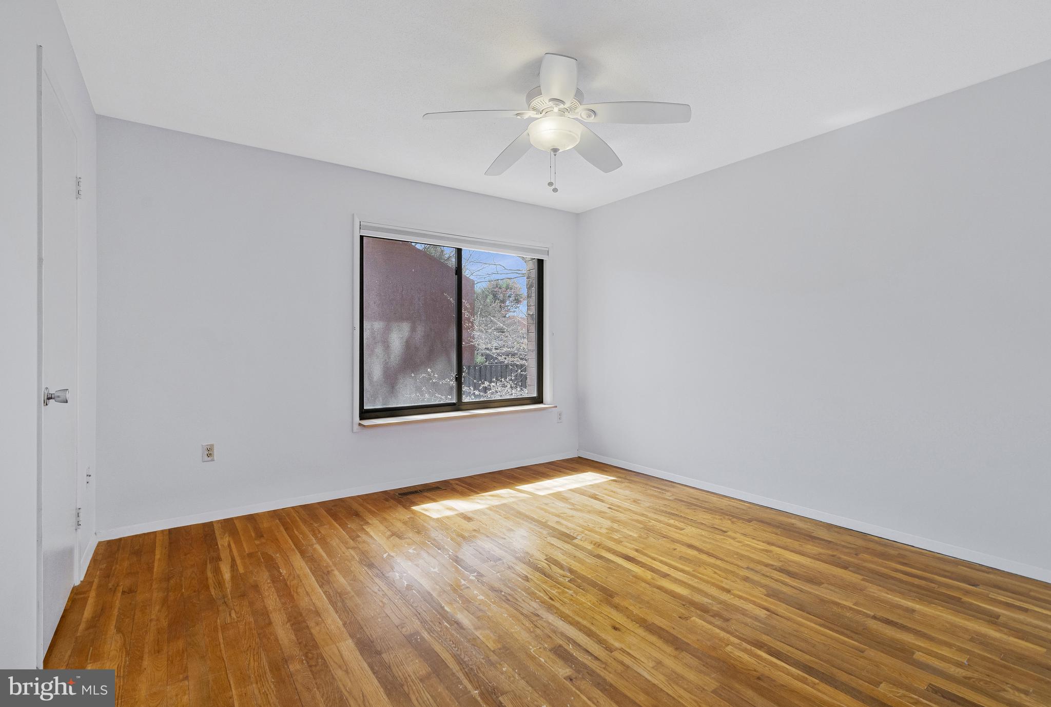 1353 Northgate Square Reston, VA 20190 - Photo 15 of 26 Primary bedroom with ceiling fan