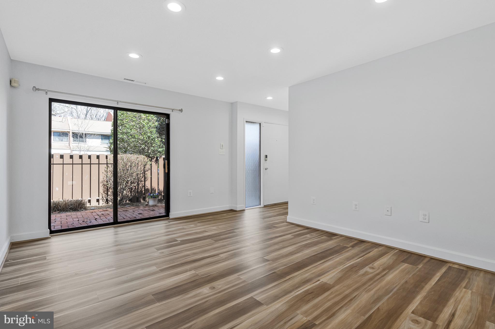 1353 Northgate Square Reston, VA 20190 - Photo 3 of 26 Family room with private courtyard out front!