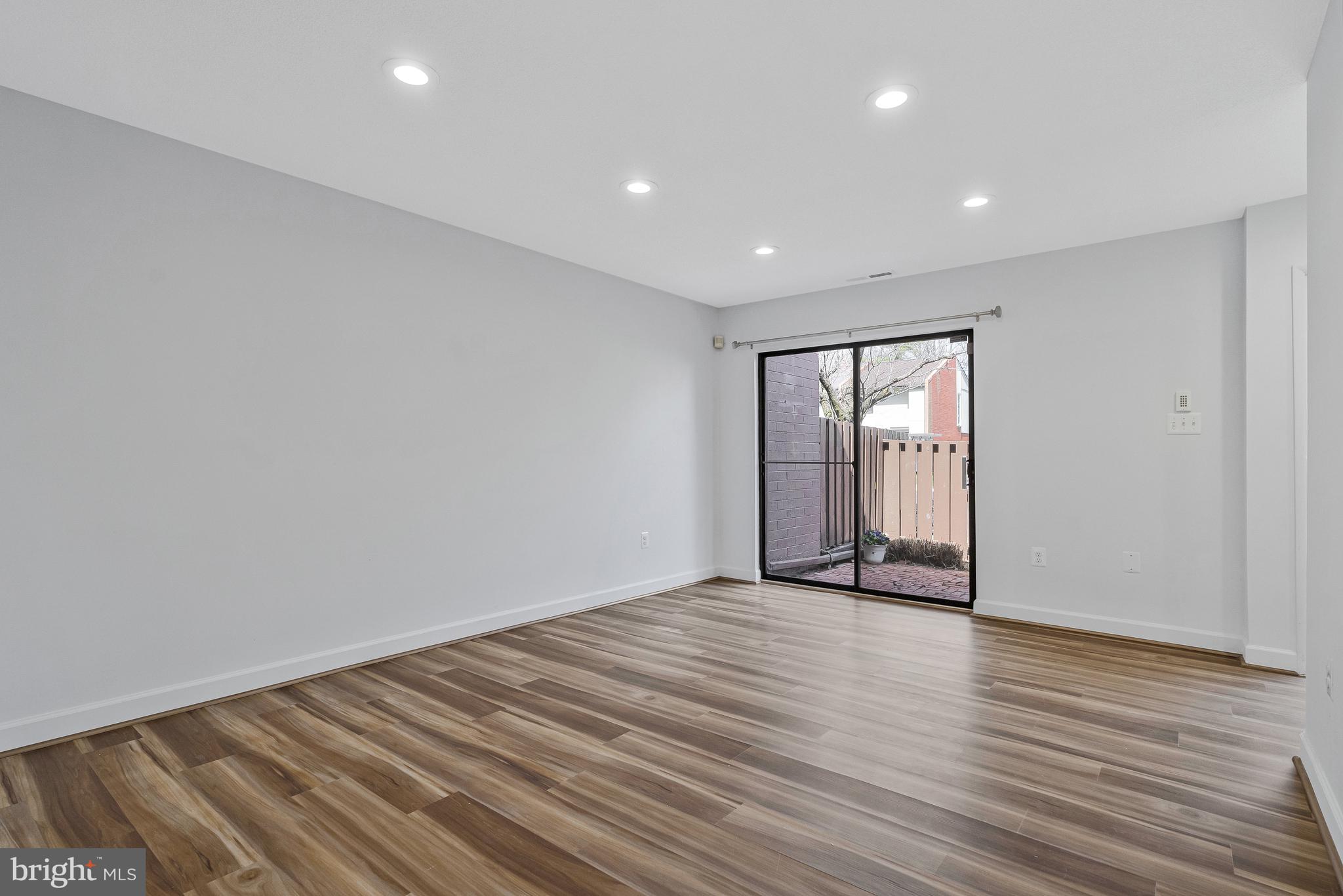 1353 Northgate Square Reston, VA 20190 - Photo 5 of 26 Access to front courtyard from family room