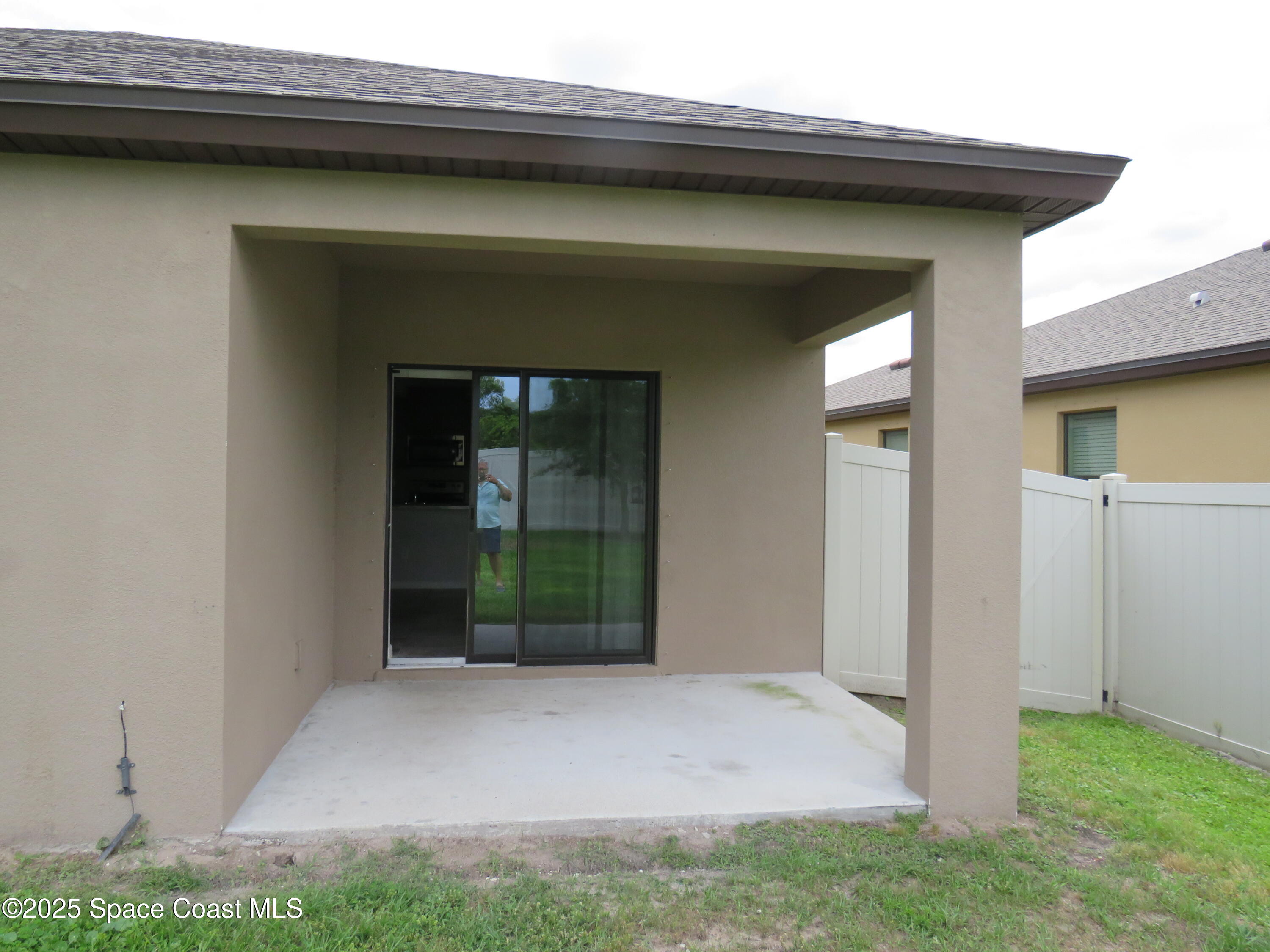 3548 Loggerhead Lane Mims, FL 32754 - Photo 12 of 25 a view of entryway with a patio