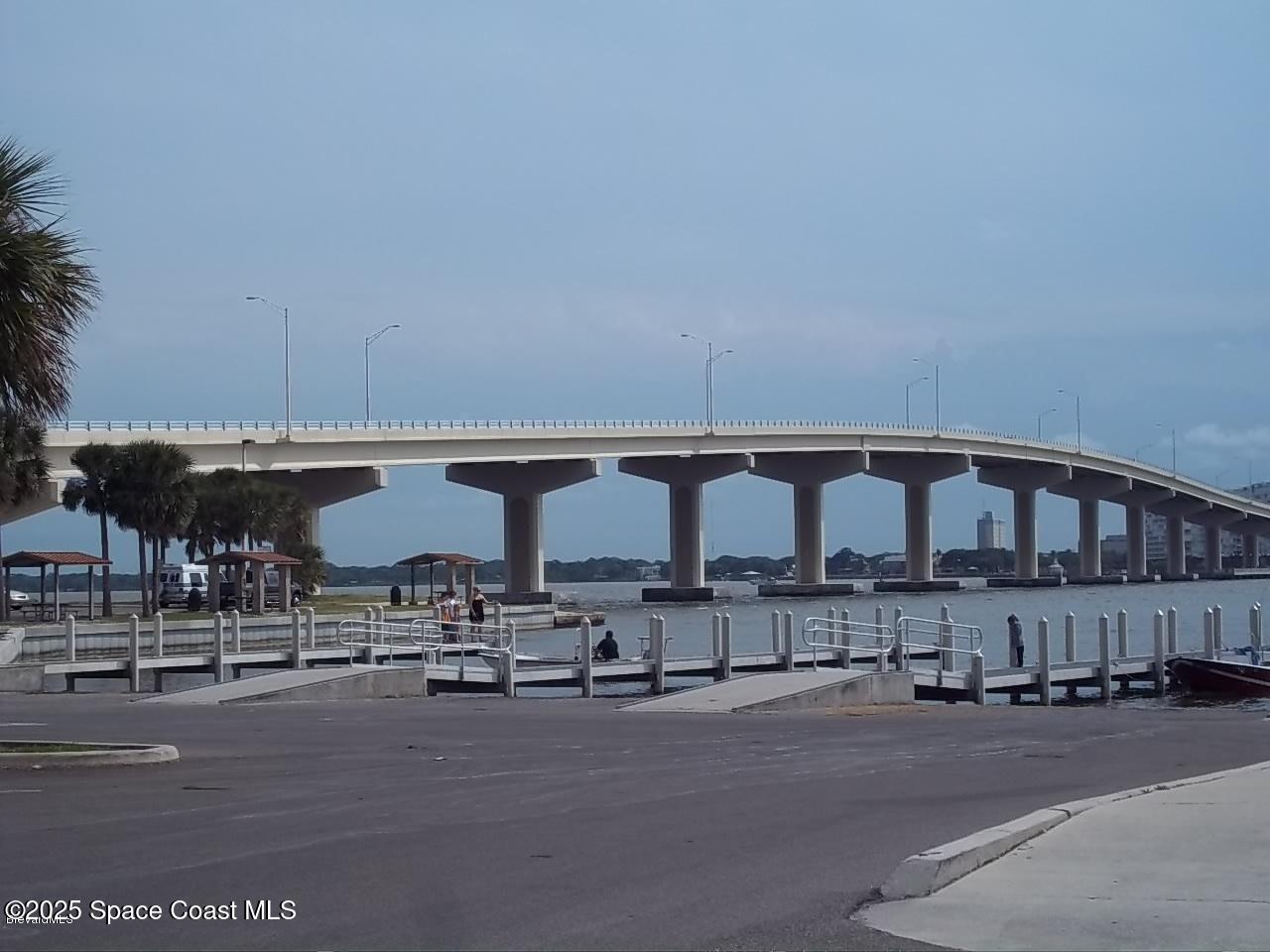 3548 Loggerhead Lane Mims, FL 32754 - Photo 18 of 25 a view of a water fountain and a cars park