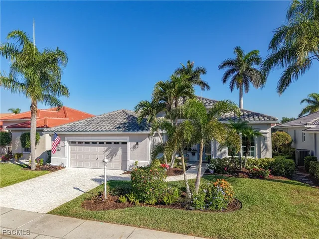 front view of a house with a garden