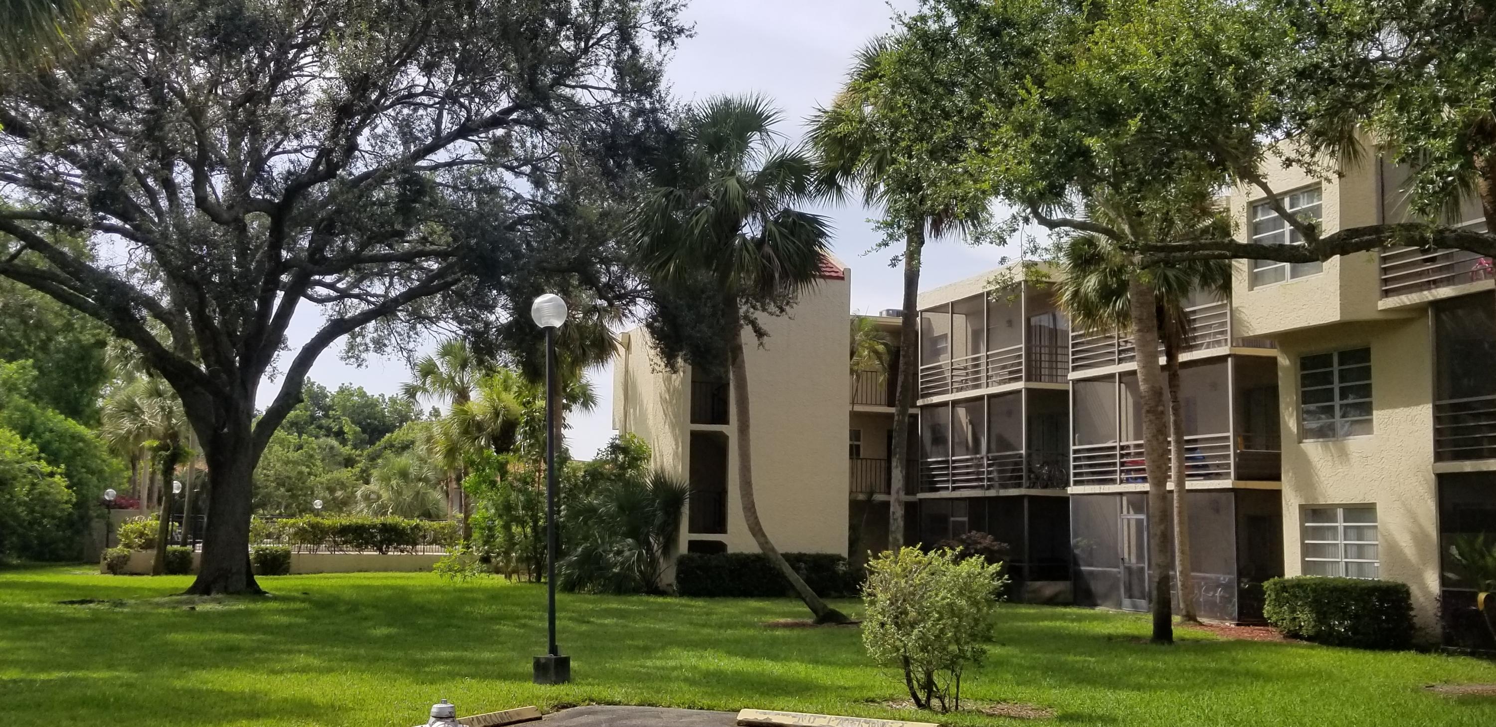3100 Riverside Drive, Unit 105 Coral Springs, FL 33065 - Photo 1 of 3 Building