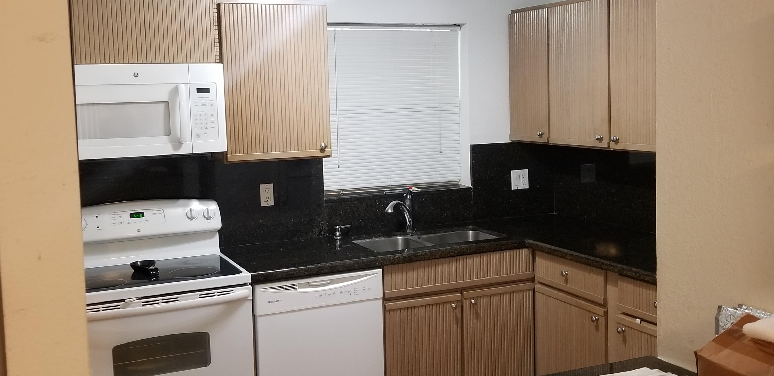 3100 Riverside Drive, Unit 105 Coral Springs, FL 33065 - Photo 2 of 3 Kitchen