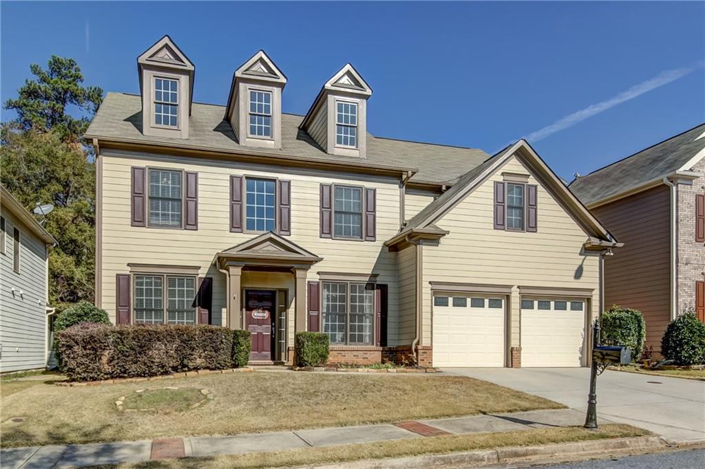 680 Maple Grove Way Marietta, GA 30066 - Photo 1 of 1 a front view of a house