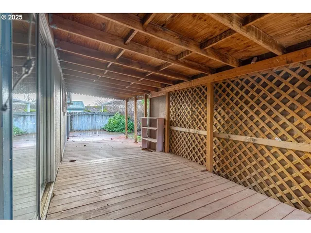 a view of outdoor space with wooden floor and roof