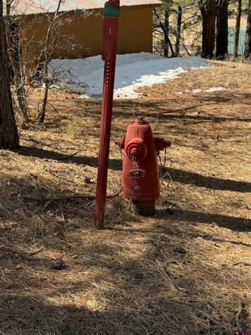 a view of a backyard of the house