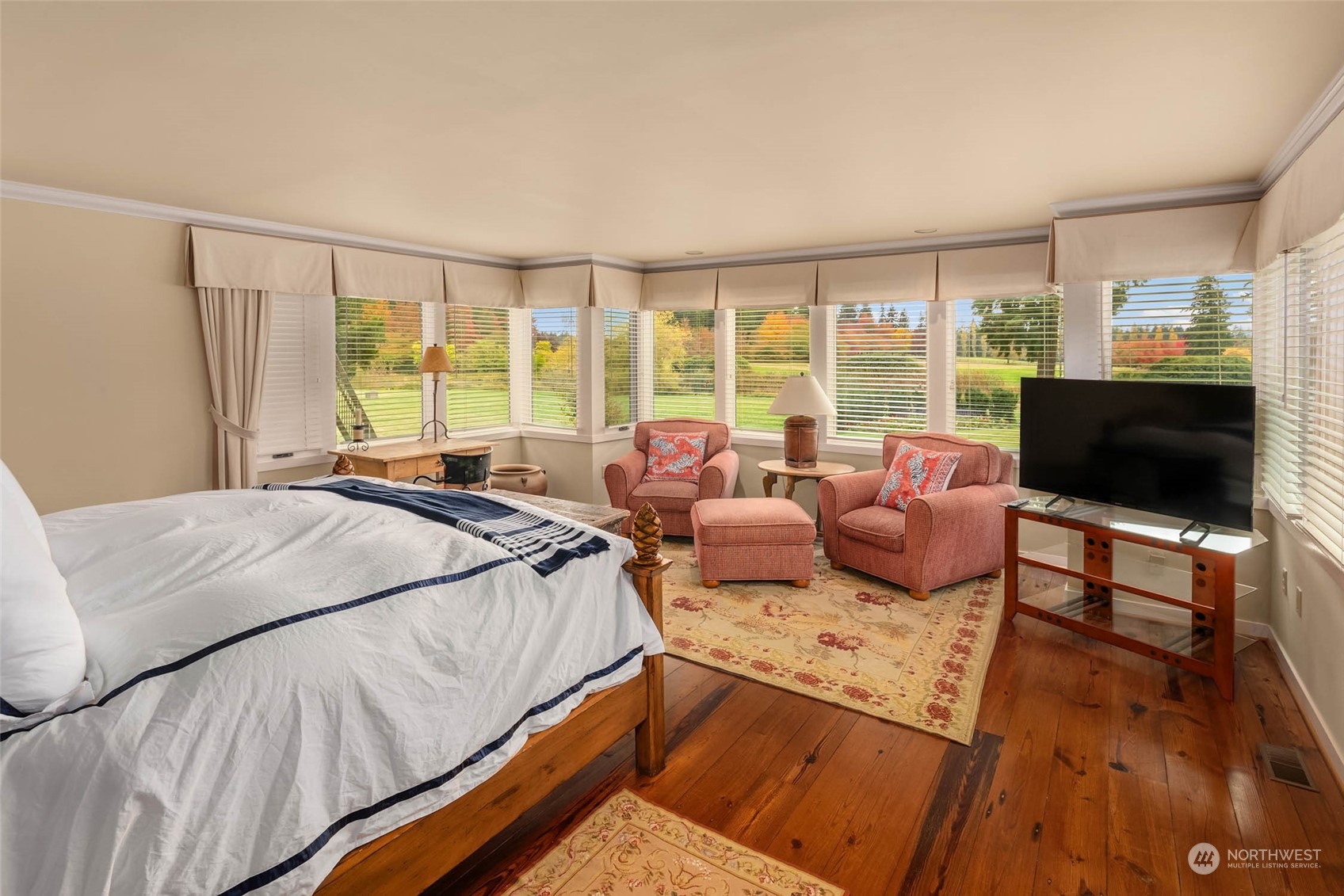 12011 Southwest 220th Street Vashon, WA 98070 - Photo 25 of 40 a bed room with a bed and a couch