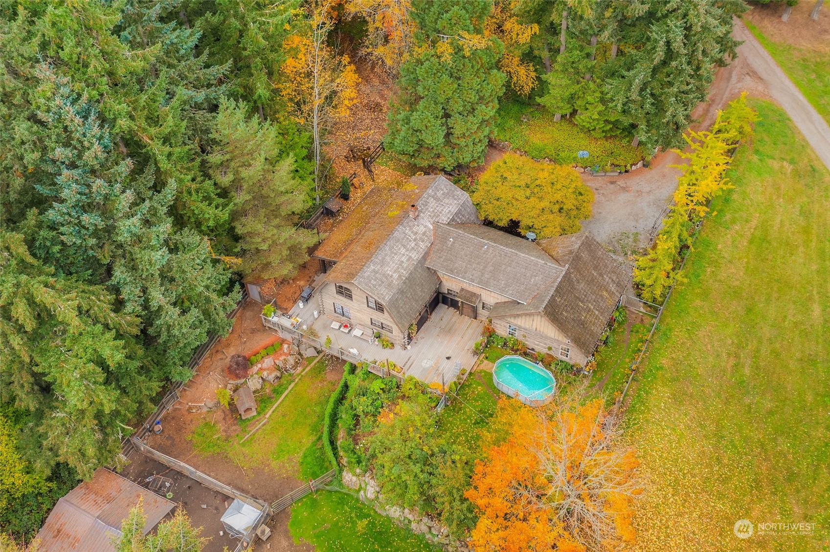 12011 Southwest 220th Street Vashon, WA 98070 - Photo 36 of 40 an aerial view of residential house with swimming pool and swimming pool