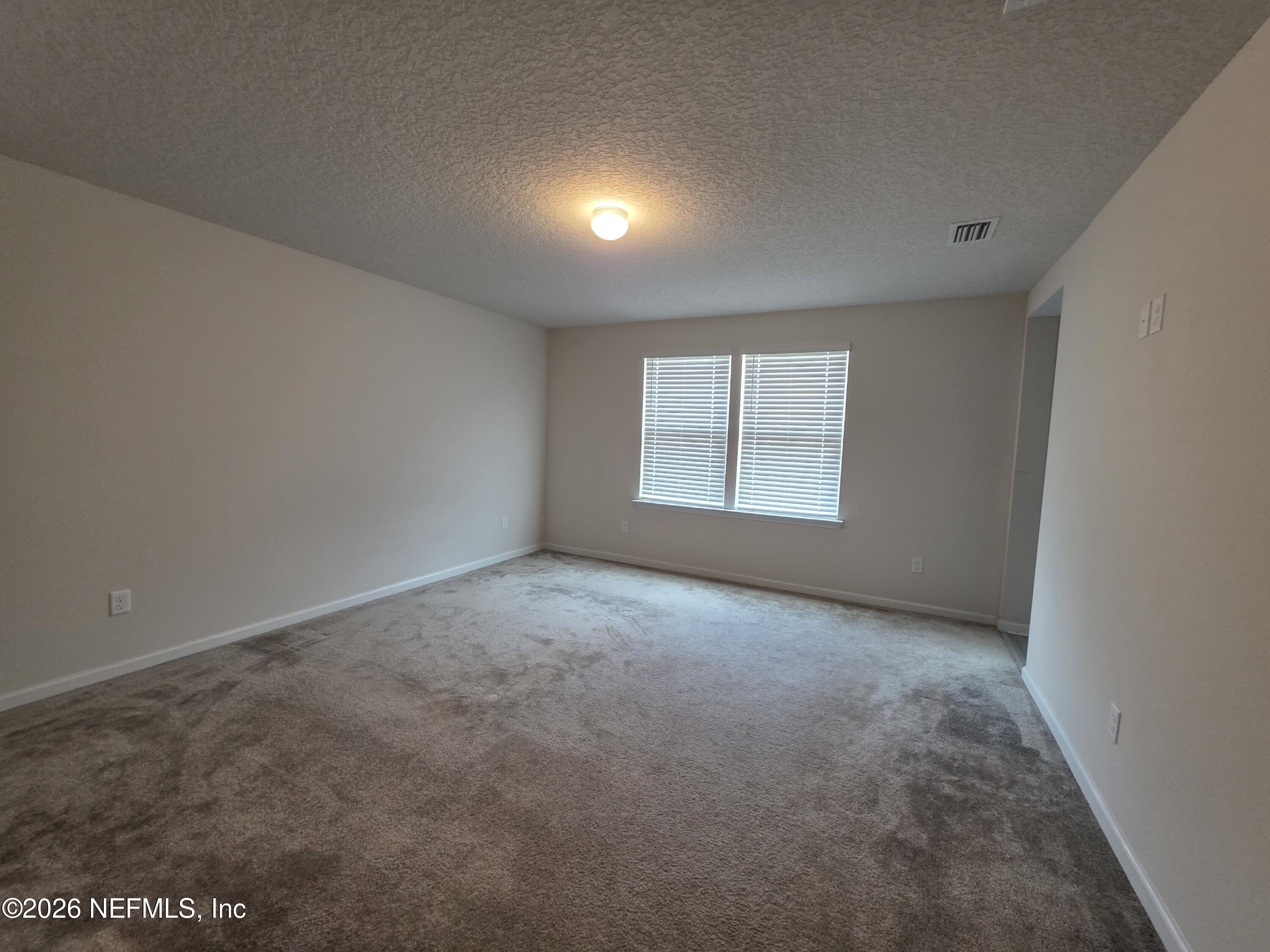 4537 Pine Ridge Parkway Middleburg, FL 32068 - Photo 18 of 30 Master bedroom