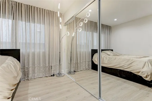a bathroom with a double vanity sink mirror and shower