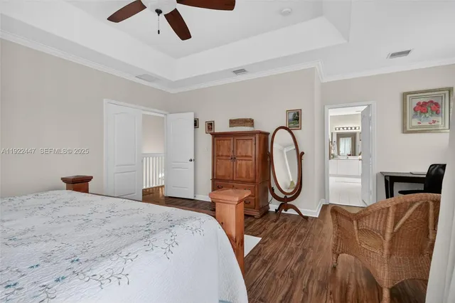 a view of backyard with a patio and plants