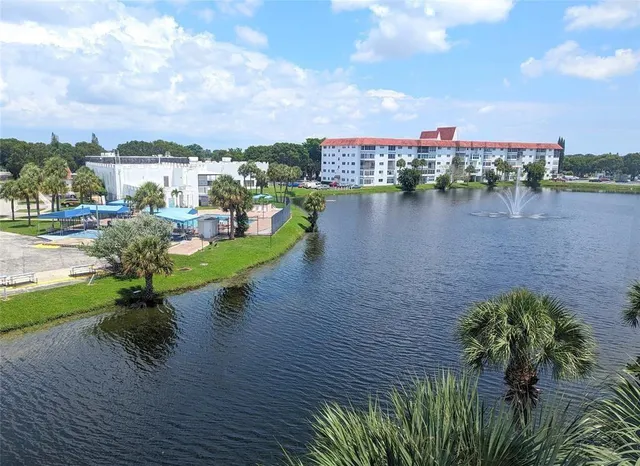 a view of a lake with a city