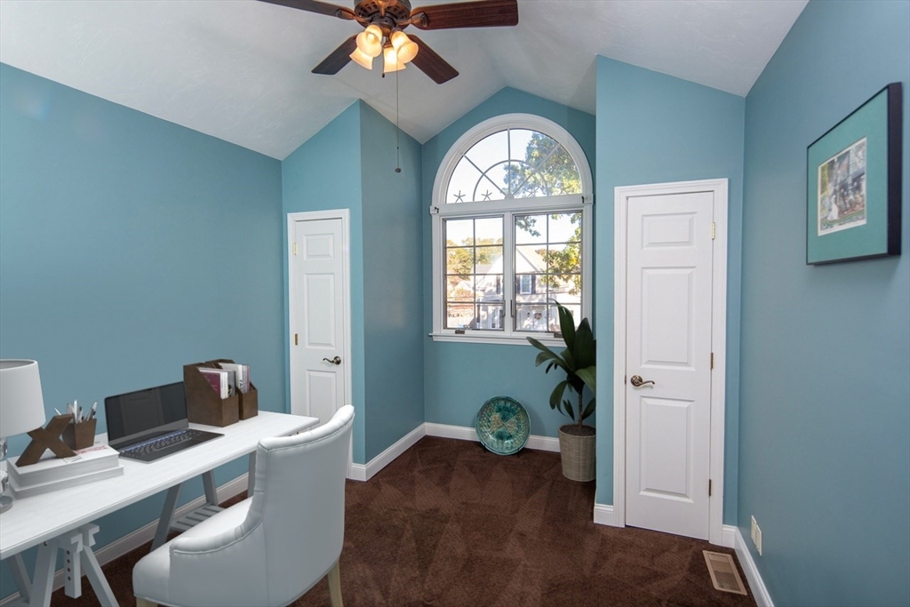 40 Lazel Street Whitman, MA 02382 - Photo 13 of 20 a workspace with chandelier wooden floor and a window