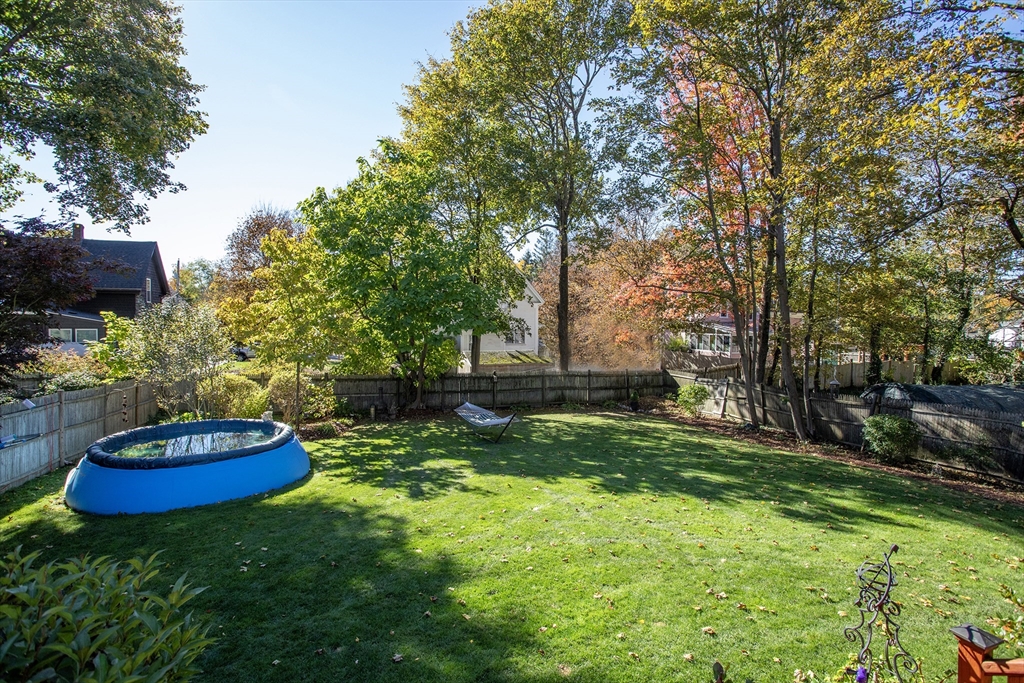 40 Lazel Street Whitman, MA 02382 - Photo 18 of 20 a big yard with lots of green space and plants