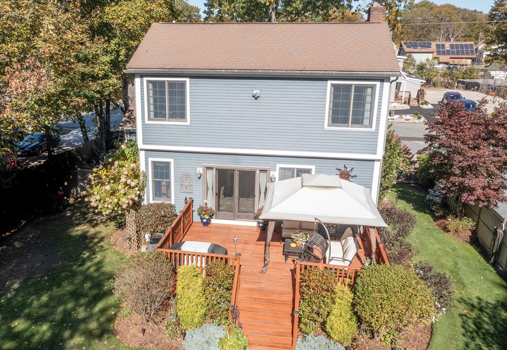 40 Lazel Street Whitman, MA 02382 - Photo 19 of 20 a aerial view of a house with swimming pool and sitting area