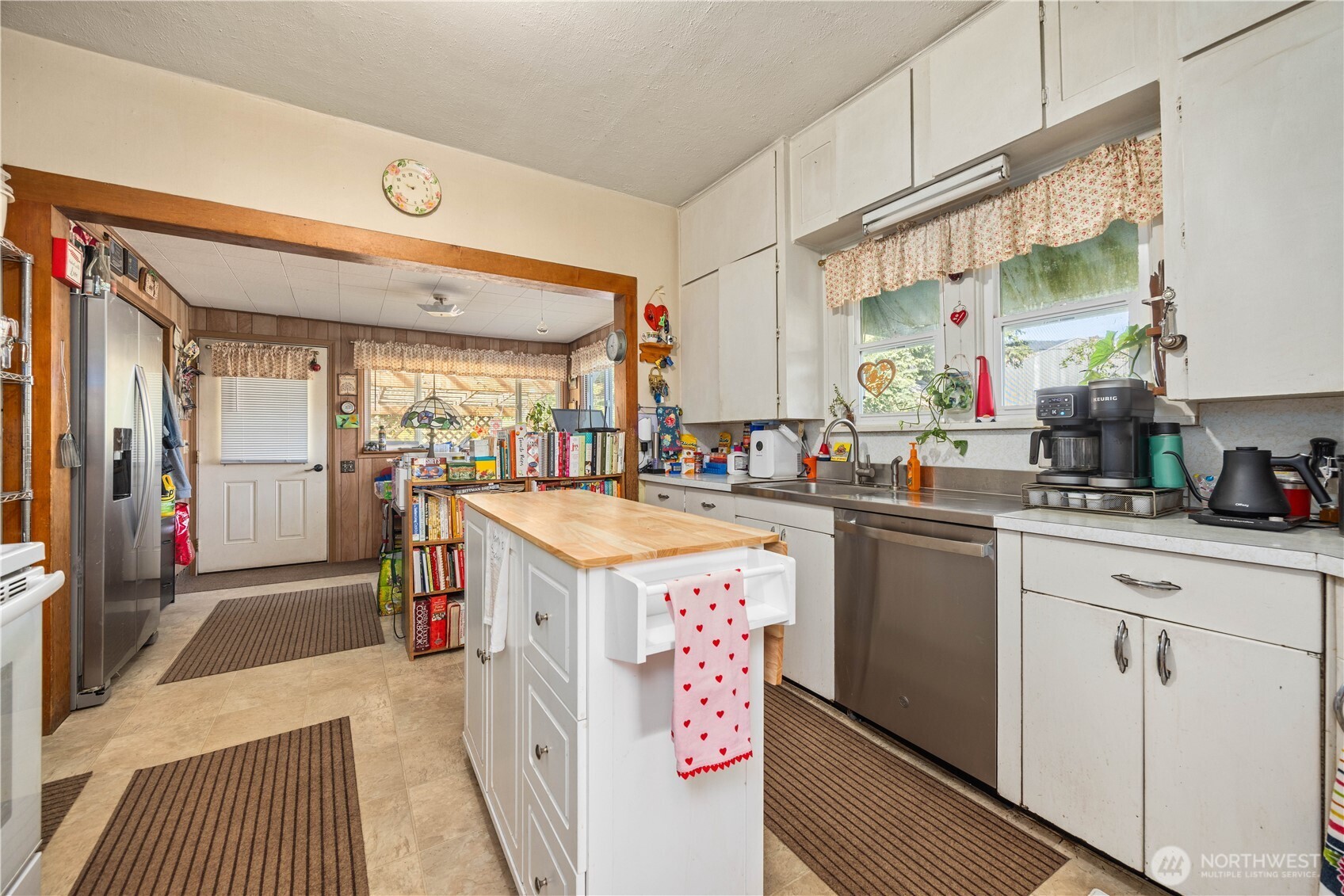 1281 Totem Pole Road Manson, WA 98831 - Photo 17 of 39 a kitchen with stainless steel appliances granite countertop a sink and cabinets