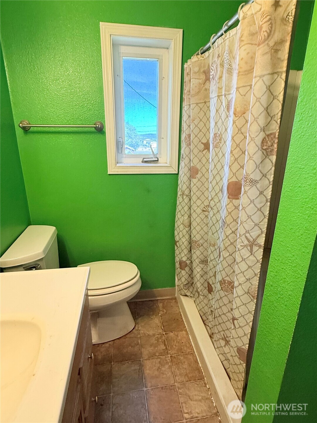 150 Southwest South 1st Creston, WA 99117 - Photo 7 of 22 a bathroom with a toilet and a shower