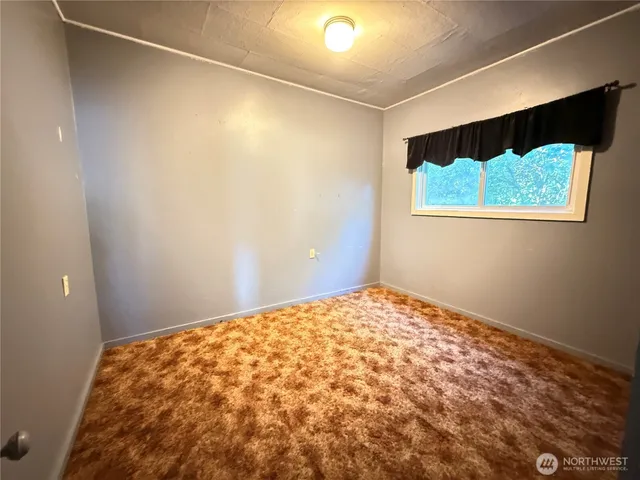 a view of empty room with window