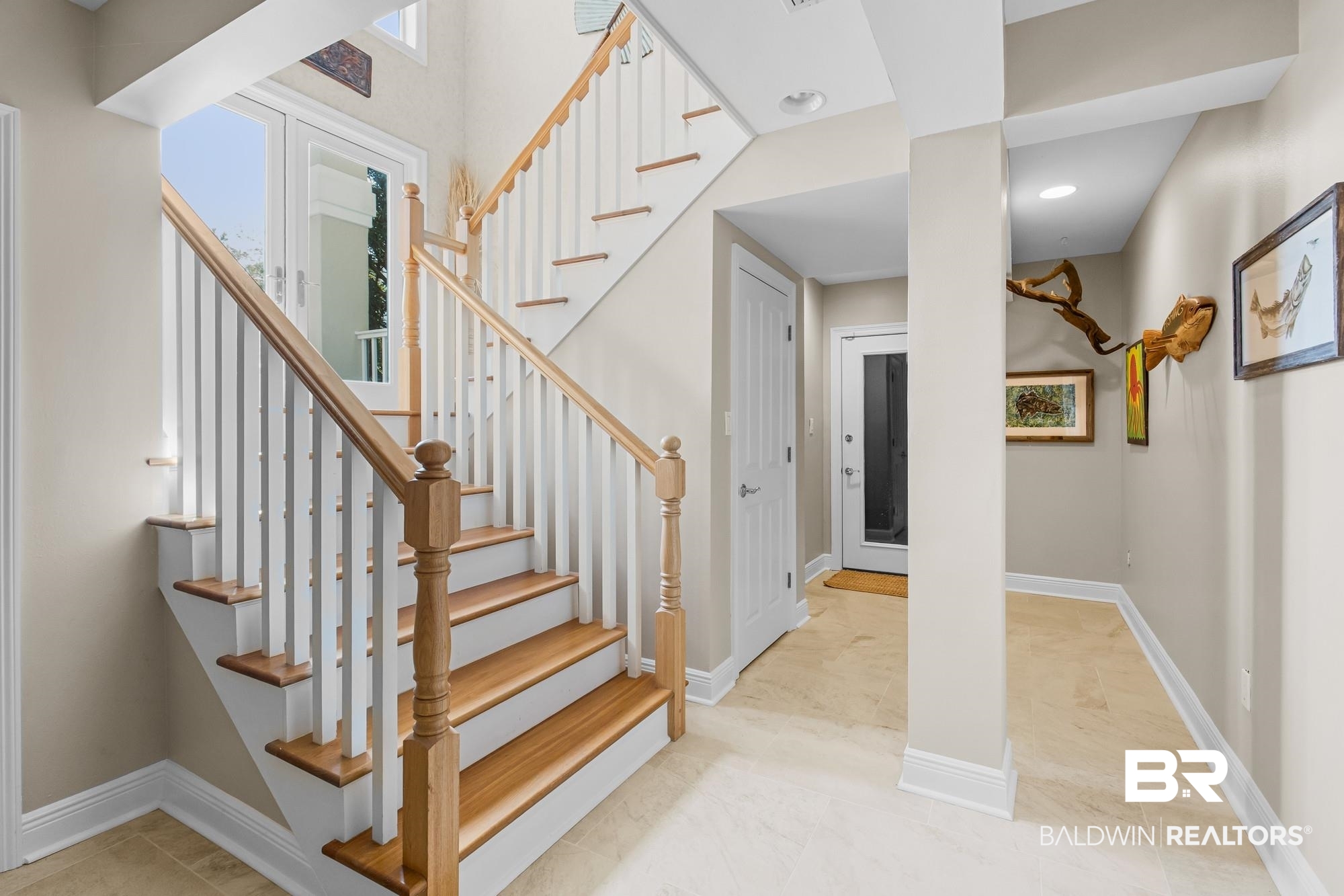 32191 River Road Orange Beach, AL 36561 - Photo 3 of 46 Stairway featuring baseboards