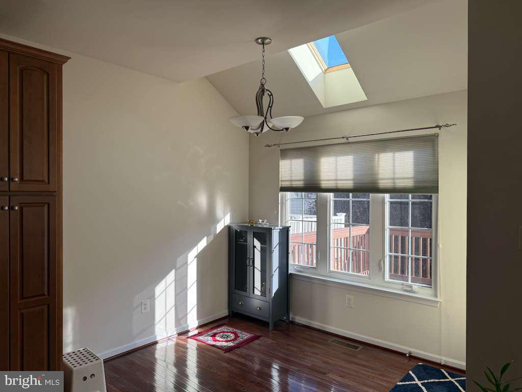 25210 Whippoorwill Terrace Chantilly, VA 20152 - Photo 13 of 33 a view of entryway and hall with wooden floor