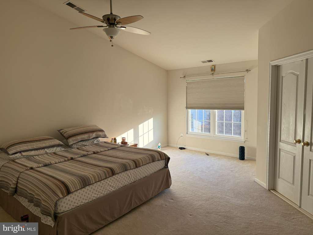 25210 Whippoorwill Terrace Chantilly, VA 20152 - Photo 19 of 33 a bedroom with a bed and a window