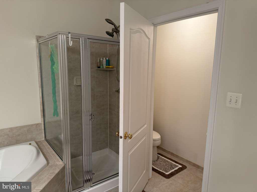 25210 Whippoorwill Terrace Chantilly, VA 20152 - Photo 23 of 33 a bathroom with a shower and a sink