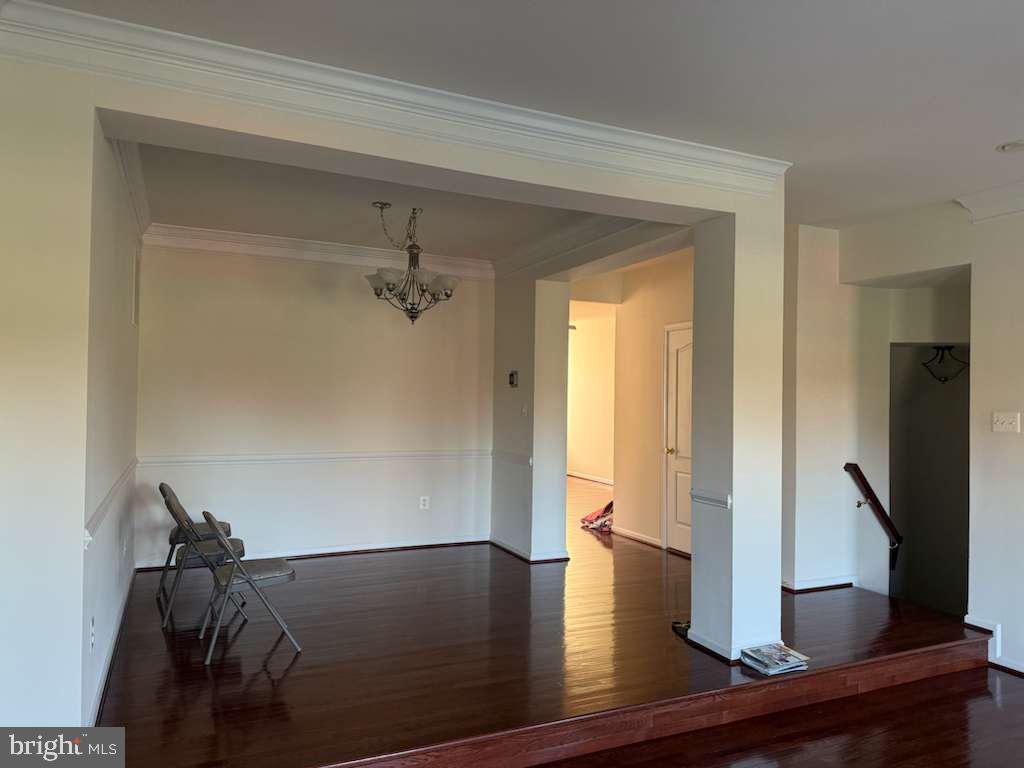 25210 Whippoorwill Terrace Chantilly, VA 20152 - Photo 6 of 33 a view of empty room with wooden floor and fan
