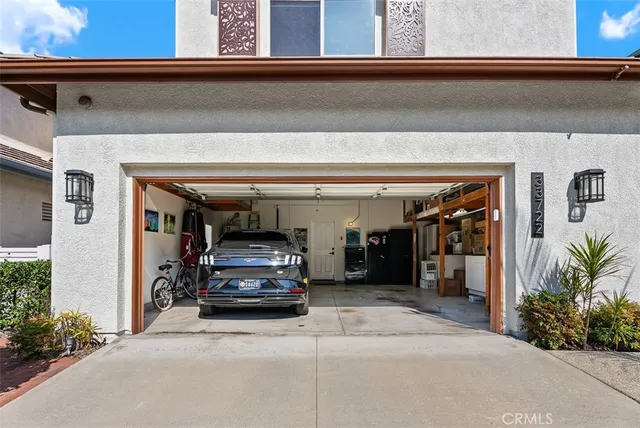 a view of car parked in front of building