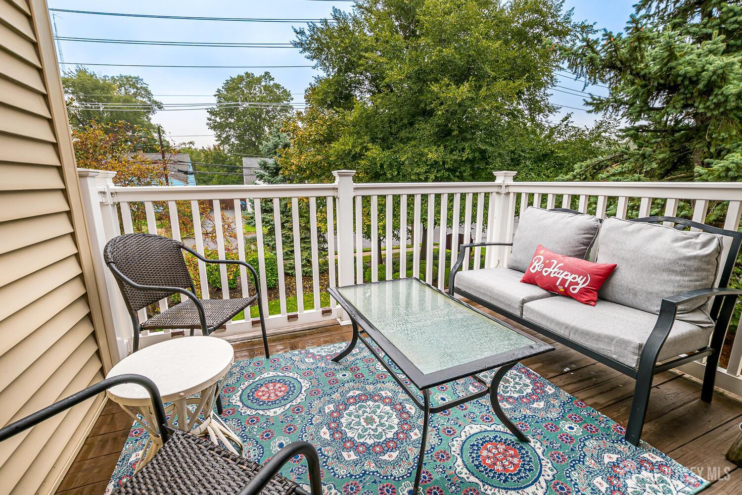 30-5 Prospect Street, Unit 2 Metuchen, NJ 08840 - Photo 12 of 23 a view of a chairs and table in the balcony