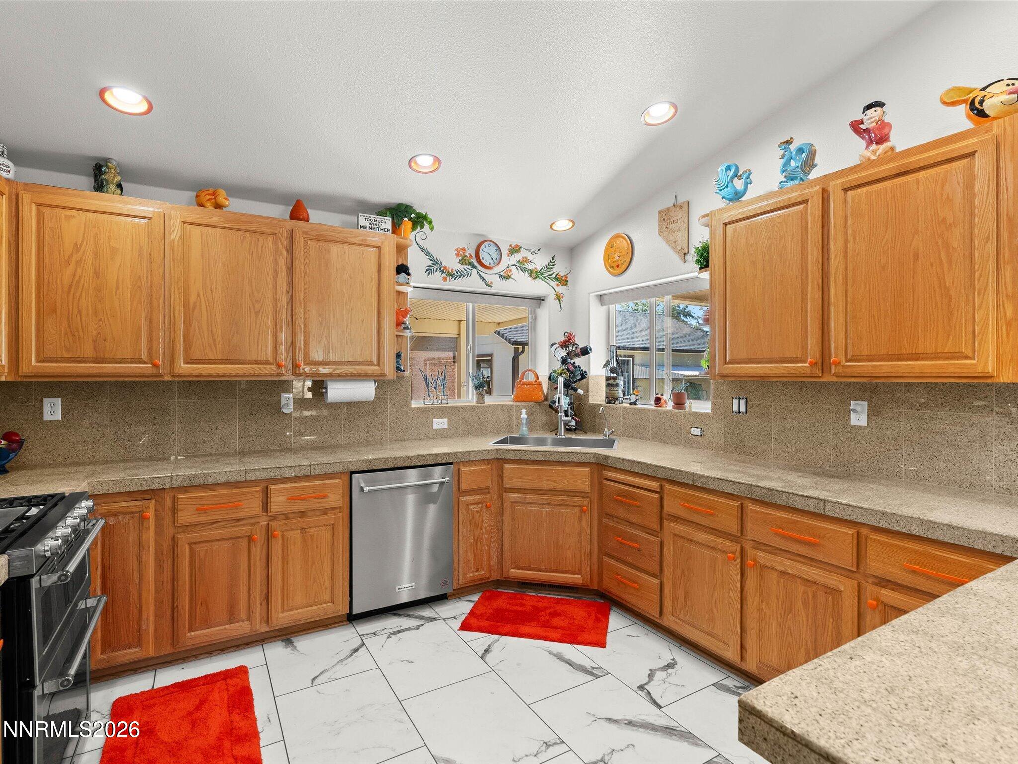 1080 Red Rock Road Fernley, NV 89408 - Photo 17 of 45 a kitchen with a sink and cabinets