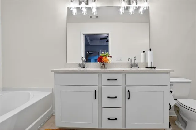 a bathroom with a sink and a bathtub