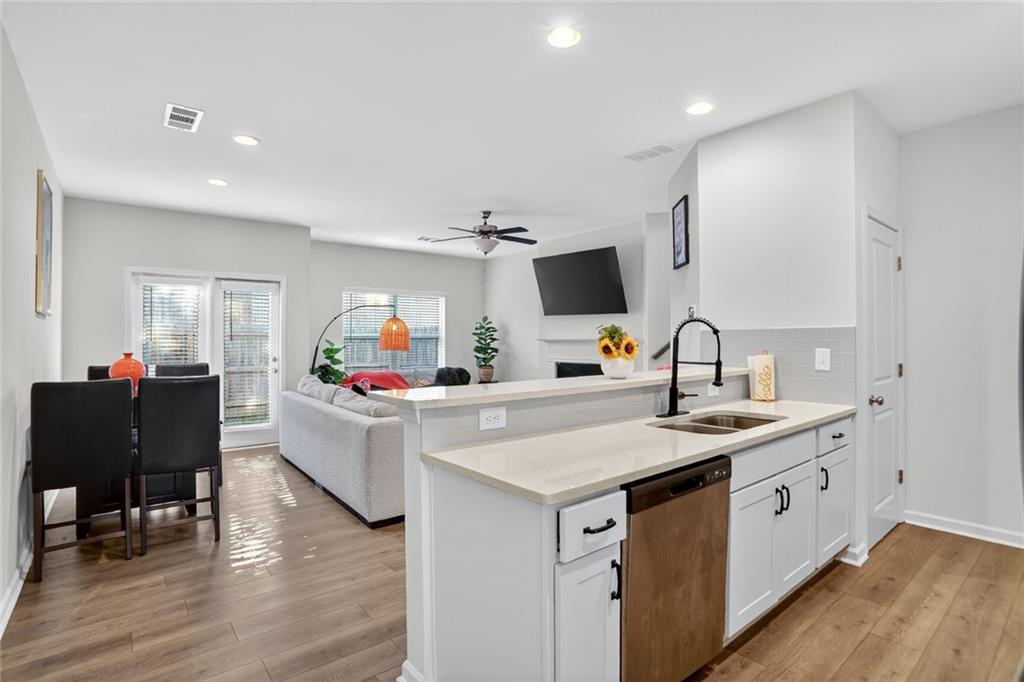 4125 Spring Valley Circle, Unit 7 Tucker, GA 30084 - Photo 6 of 20 a living room with furniture and a flat screen tv