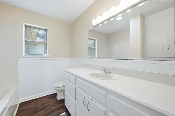 a bathroom with a sink and a toilet