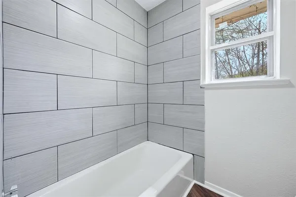 a bathroom with a bathtub