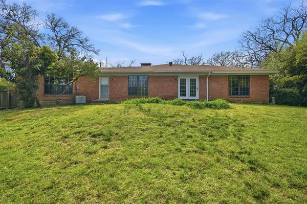 a house view with a garden space