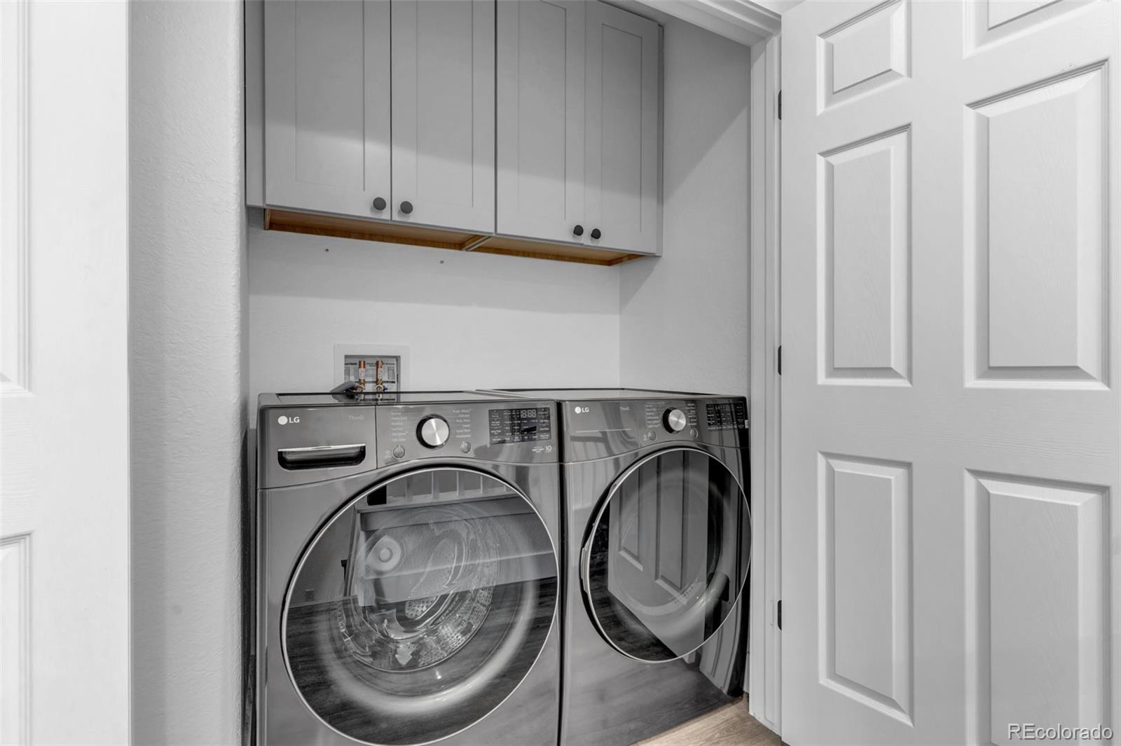 3672 South Perth Circle, Unit 105 Aurora, CO 80013 - Photo 14 of 19 a utility room with dryer and washer