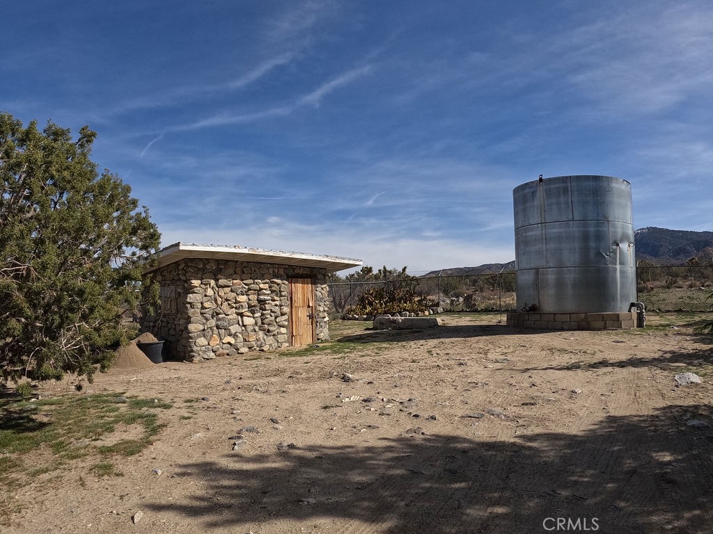 30000 Buchannon Ranch Road Llano, CA 93544 - Photo 23 of 64 a view of a terrace with a outdoor space