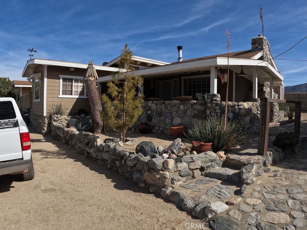 30000 Buchannon Ranch Road Llano, CA 93544 - Photo 36 of 67 a view of house with yard outdoor seating