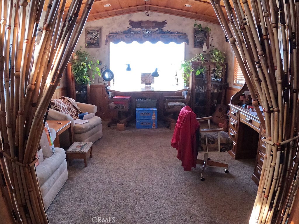 30000 Buchannon Ranch Road Llano, CA 93544 - Photo 56 of 67 a workspace with furniture and a fireplace